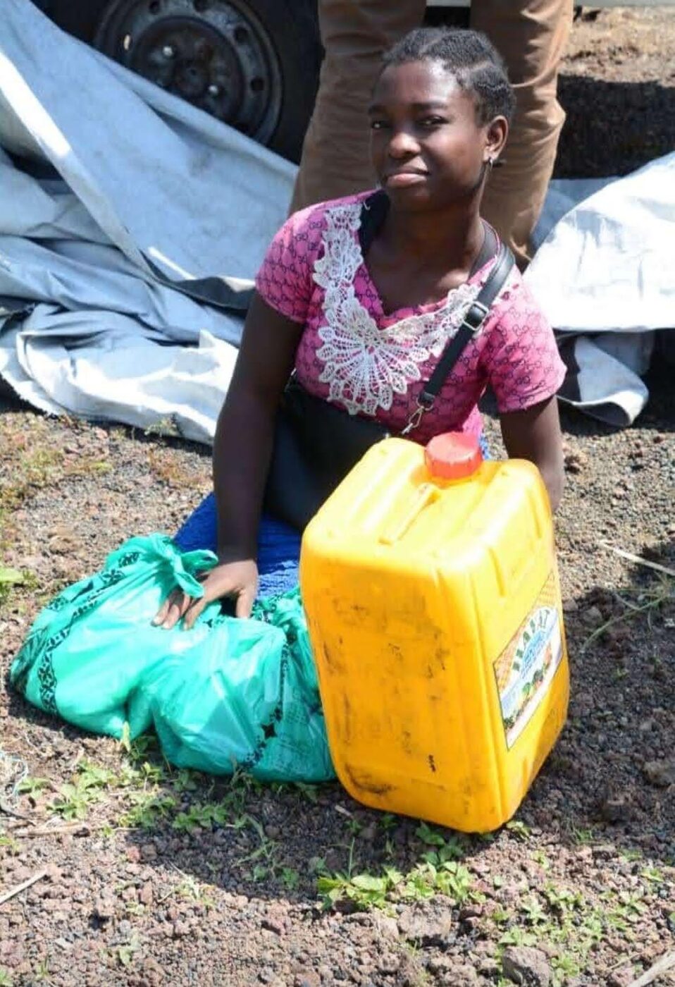 Group of community members with donated buckets